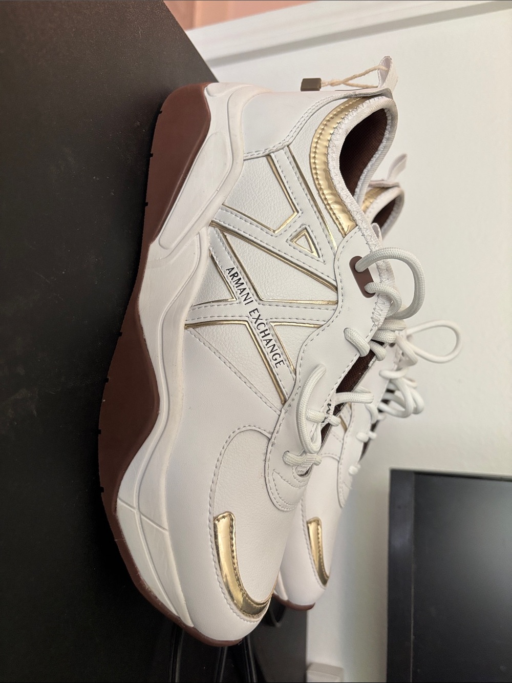 Armani Exchange White Sneakers with Gold Accents and Brown Sole
